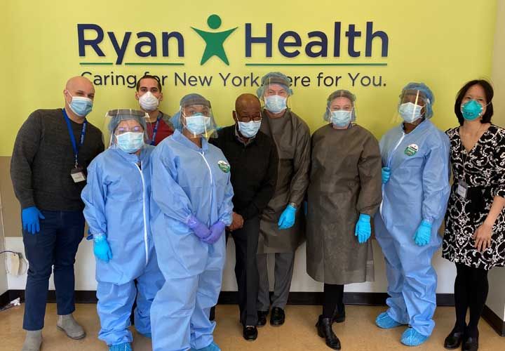 a group of Ryan Health staff wearing PPE posing for a photo